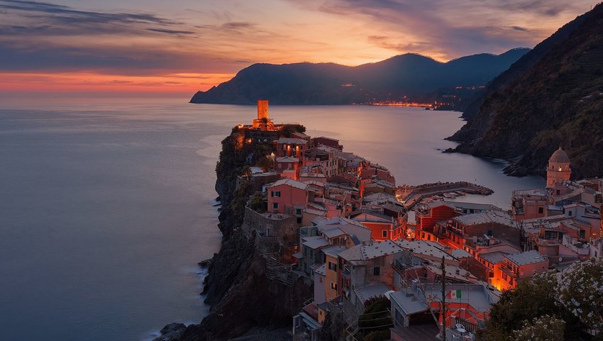 Sunset over homes sticking out on peninsula