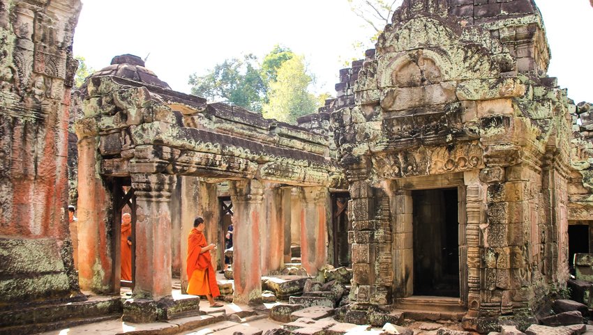 People walking through Angkor Wat 