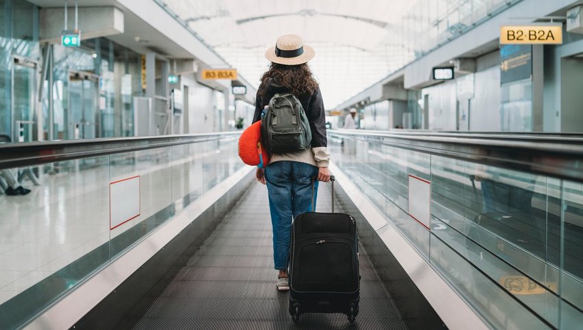 Person in airport with luggage