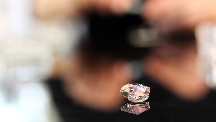 Swarovski crystal on reflective table 