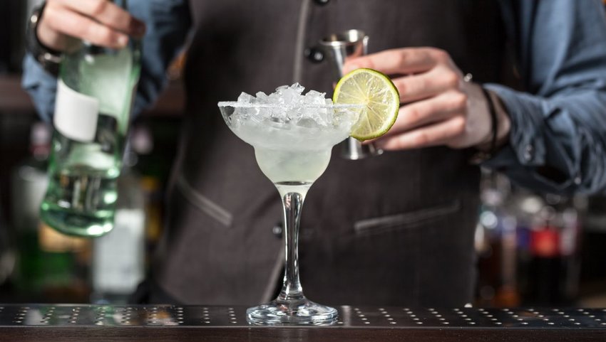 Bartender mixing a margarita