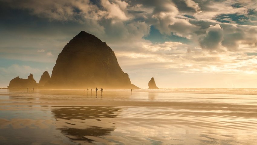 People walking down the beach