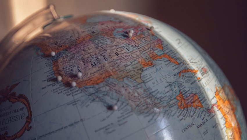 World globe with white pins 