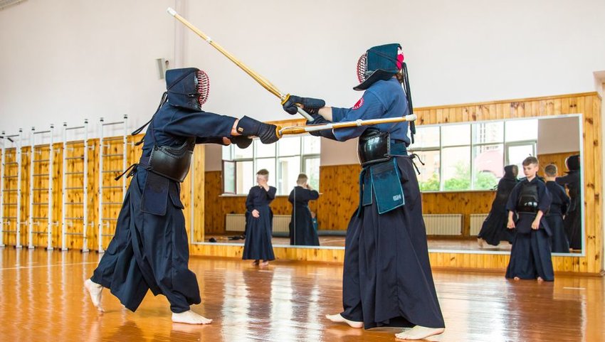 Two people Keno sword fighting 