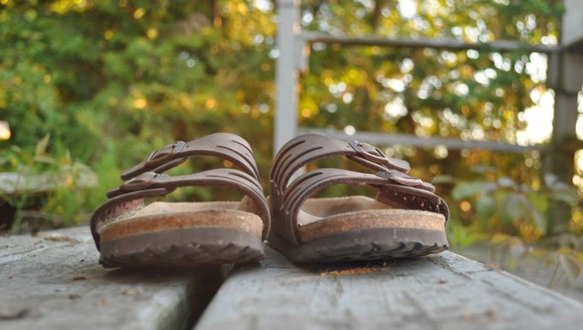 Pair of Birkenstock sandals sitting on steps