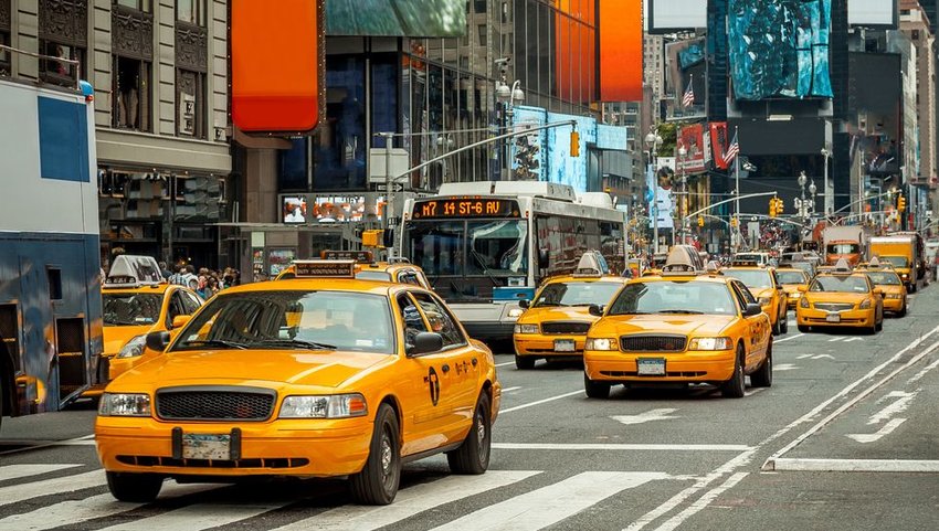Taxis driving through Times Square 