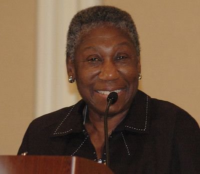 Barbara Hillary speaking from a podium