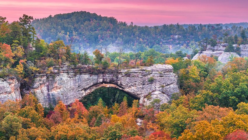 Daniel Boone National Forest, Kenucky, USA at the Natural Arch at dusk in autumn