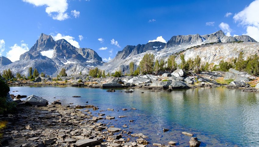 The Sierra Nevadas with stream in front on the John Muir Trail 