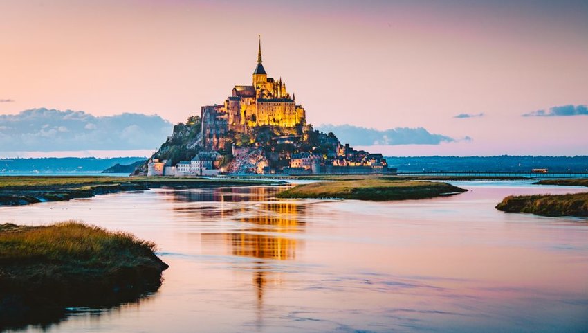 Le Mont Saint-Michel tidal island at dusk, Normandy, northern France