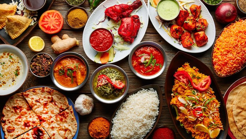 Various dishes on wooden table 