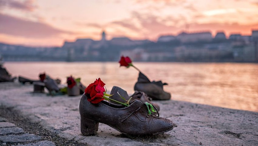 Shoes on the bank of the Danube at sunset in Budapest, Hungary