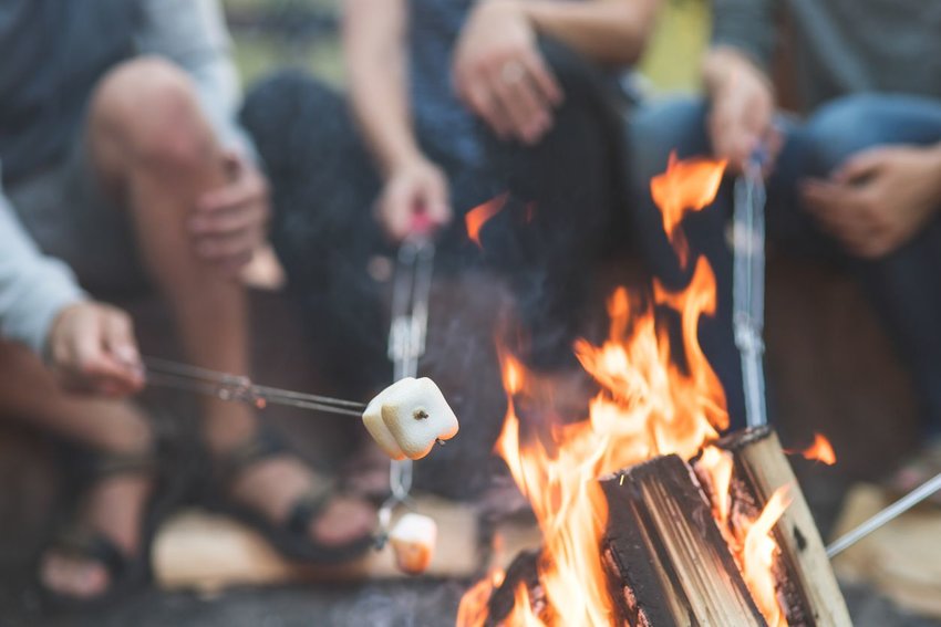 Roasting marshmallows over a fire