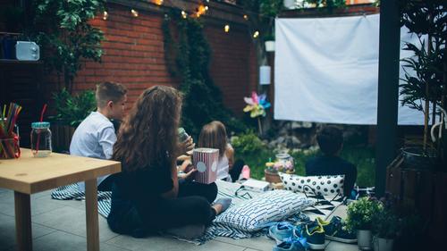How To Turn Your Backyard Into a Movie Theater