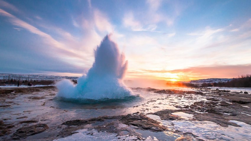 Eruption of Strokkur geyser in Iceland. Photo by ZinaidaSopina.