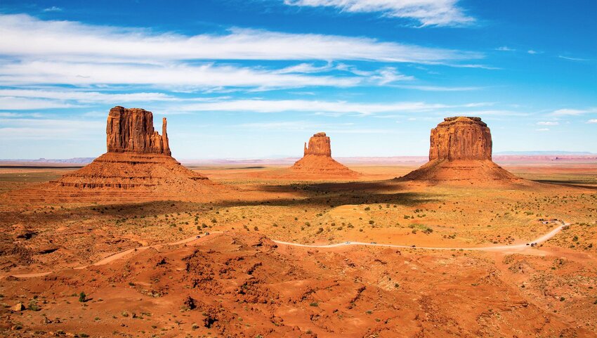 An aerial view of Arizona's Monument Valley on a sunny day.