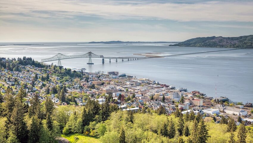 Aerial of Astoria, Oregon cityscape with Astoria-Megler Bridge.