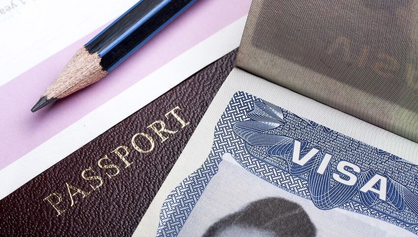 Passport, visa, and pencil. 