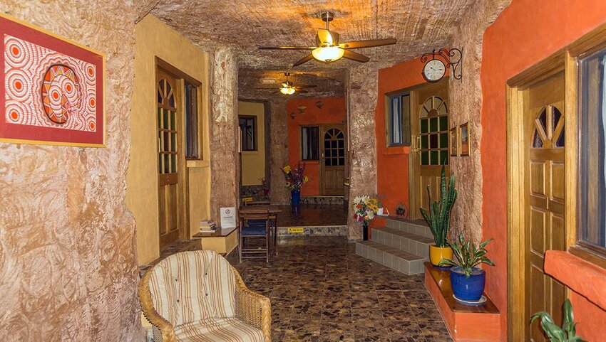 Hallway with doors to rooms in Desert Cave Hotel.