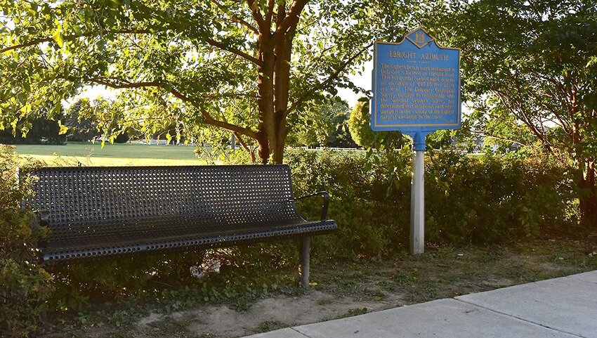 Park bench and marker sign for Ebright Azimuth.