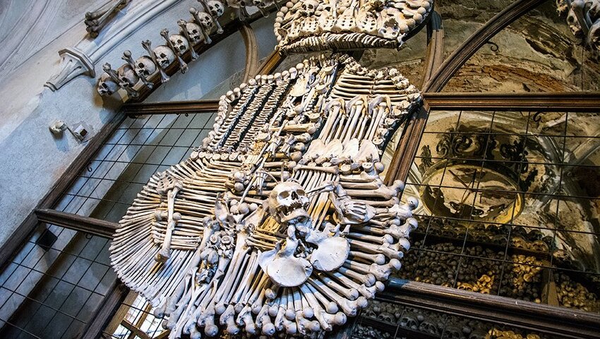 Royal crest formed out of skulls and bones in the Sedlec Ossuary.