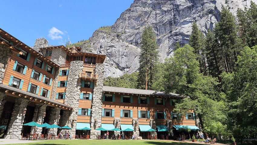 The Ahwahnee Hotel with mountains in the background.