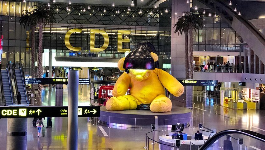The giant teddy bear sculpture in the transit area of Hamad International Airport, Doha, Qatar.
