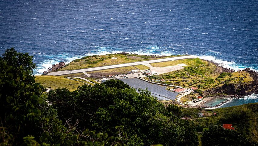 Arial of the Juancho E. Yrausquin’s Airport and runway on coast.