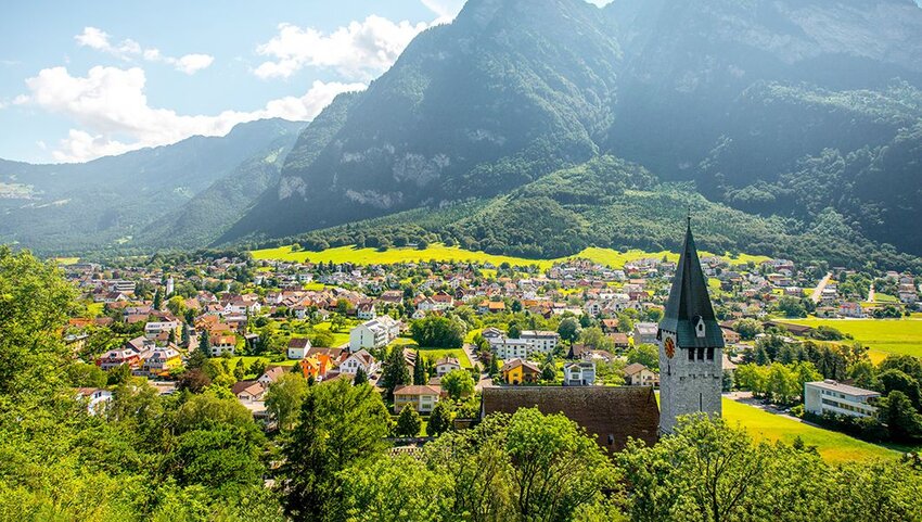 Landscape view on Balzers village with saint Nicholas church in Liechtenstein.