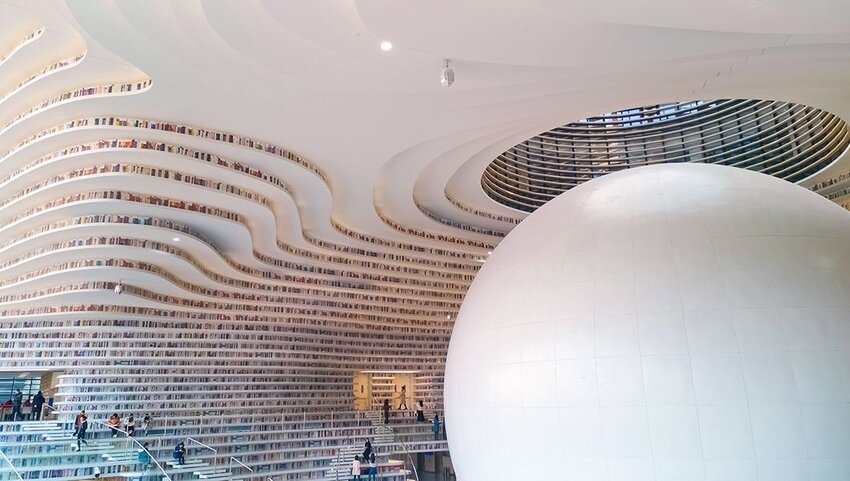 Sphere and wavy floors inside Tianjin Binhai Library. 