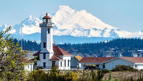 Mount Baker and lighthouse in Port Townsend, Washington.