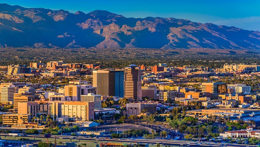 Tucson Arizona skyline and Santa Catalina Mountains at dusk.