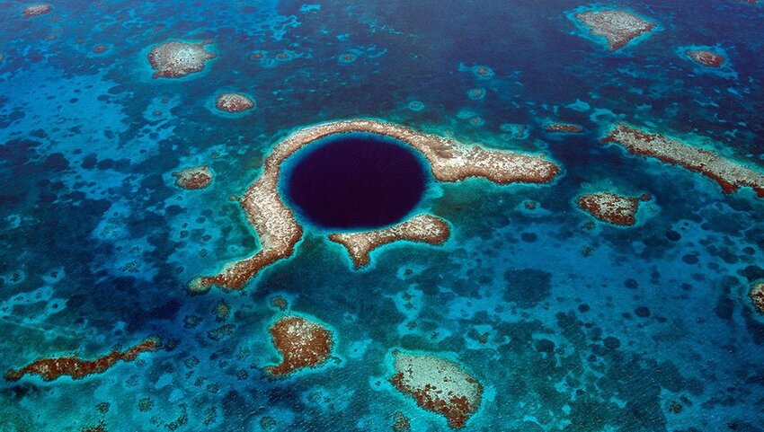 Aerial view of The Great Blue Hole, a UNESCO world natural heritage site.