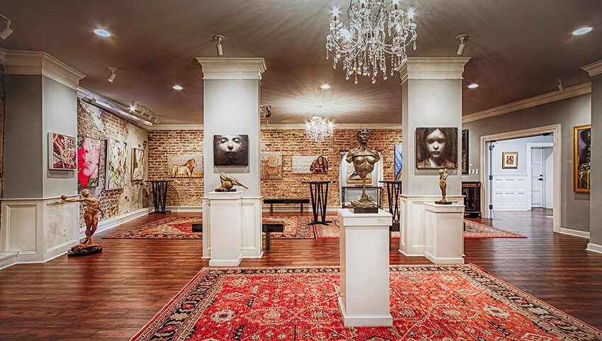 Sculptures and paints on display in gallery in The Vendue.