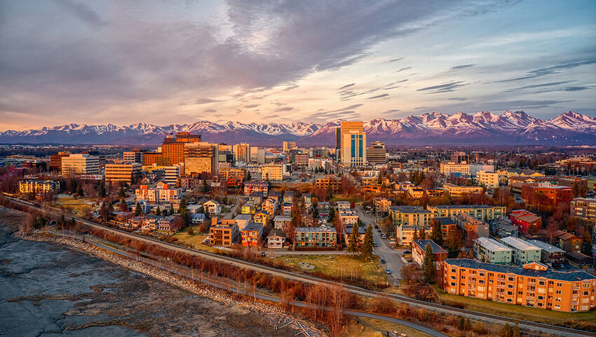 Aerial of a sunset over Downtown Anchorage, Alaska in spring.