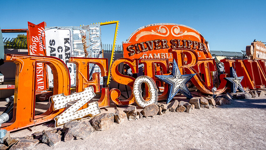 Old light up signs stacked.