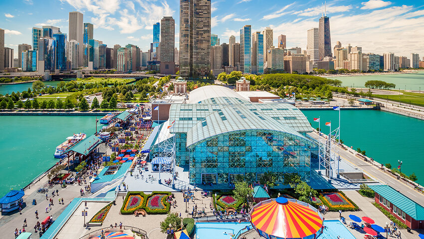 Aerial Navy Pier with skyline in background.