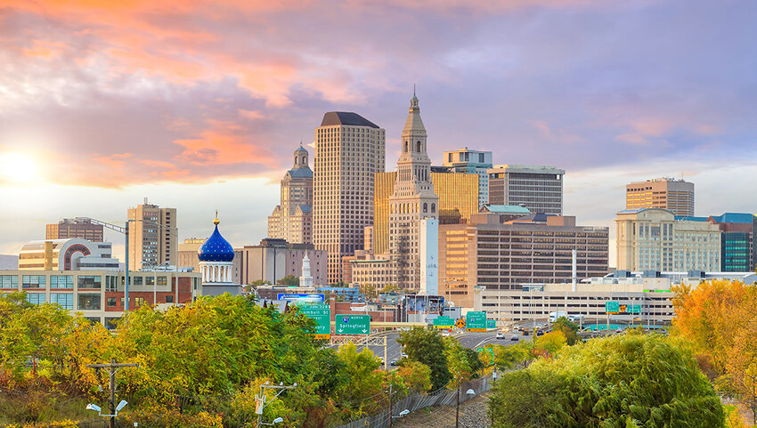 Skyline of downtown Hartford, Connecticut from above at sunset.