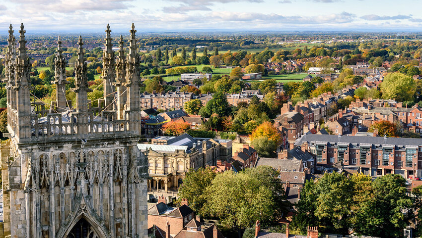 View of church spires and the city of York, England from atop York Minster.