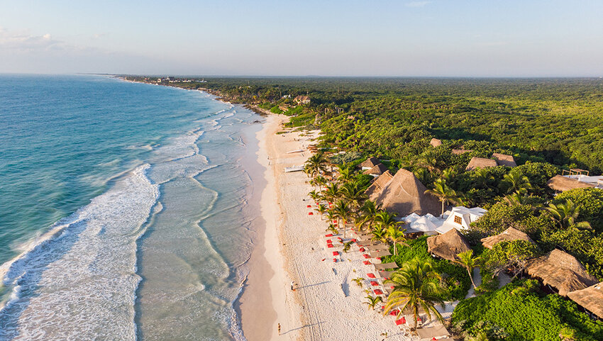 Aerial of Tulum beach at sunrise.