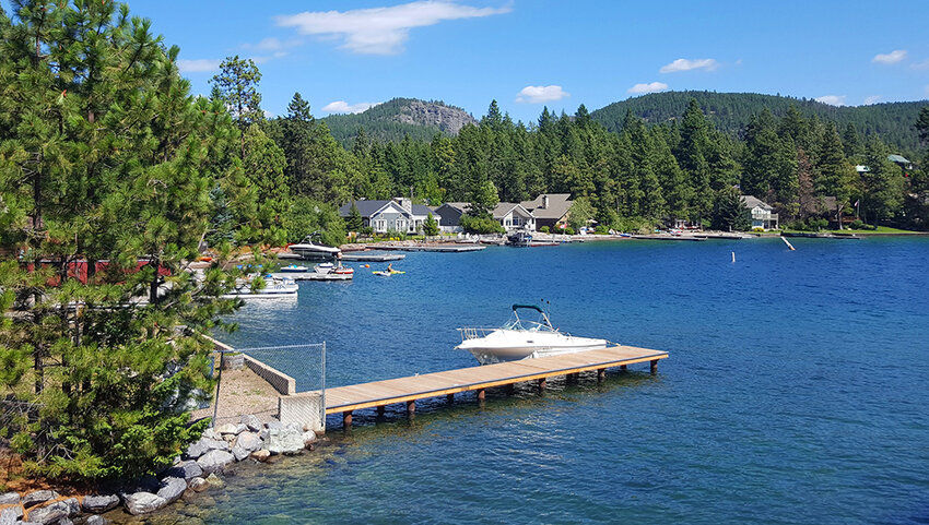 Small wooded lake with private cottages,boats and docks.