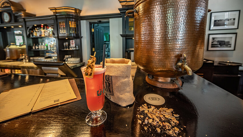 Peanuts and Singapore Sling at the Long Bar at Raffles Hotel.