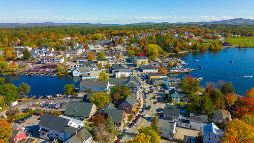 Wolfeboro historic town center at Lake Winnipesaukee, aerial view in fall on Main Street.