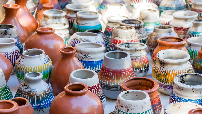 Handcrafted pottery on display at shop. 