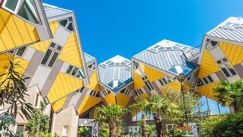 Cluster of yellow cube houses.