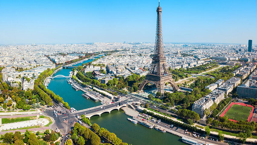 Aerial of Paris, with Eiffel Tower and river.  