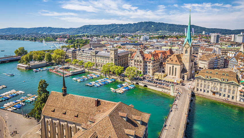 Aerial view of Zurich city center with Fraumunster Church and Limmat River.